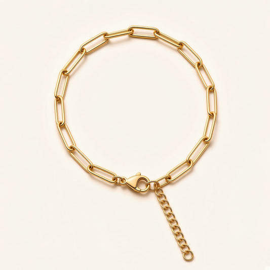 Denoon London paperclip chain bracelet with extender, gold-tone, flat lay