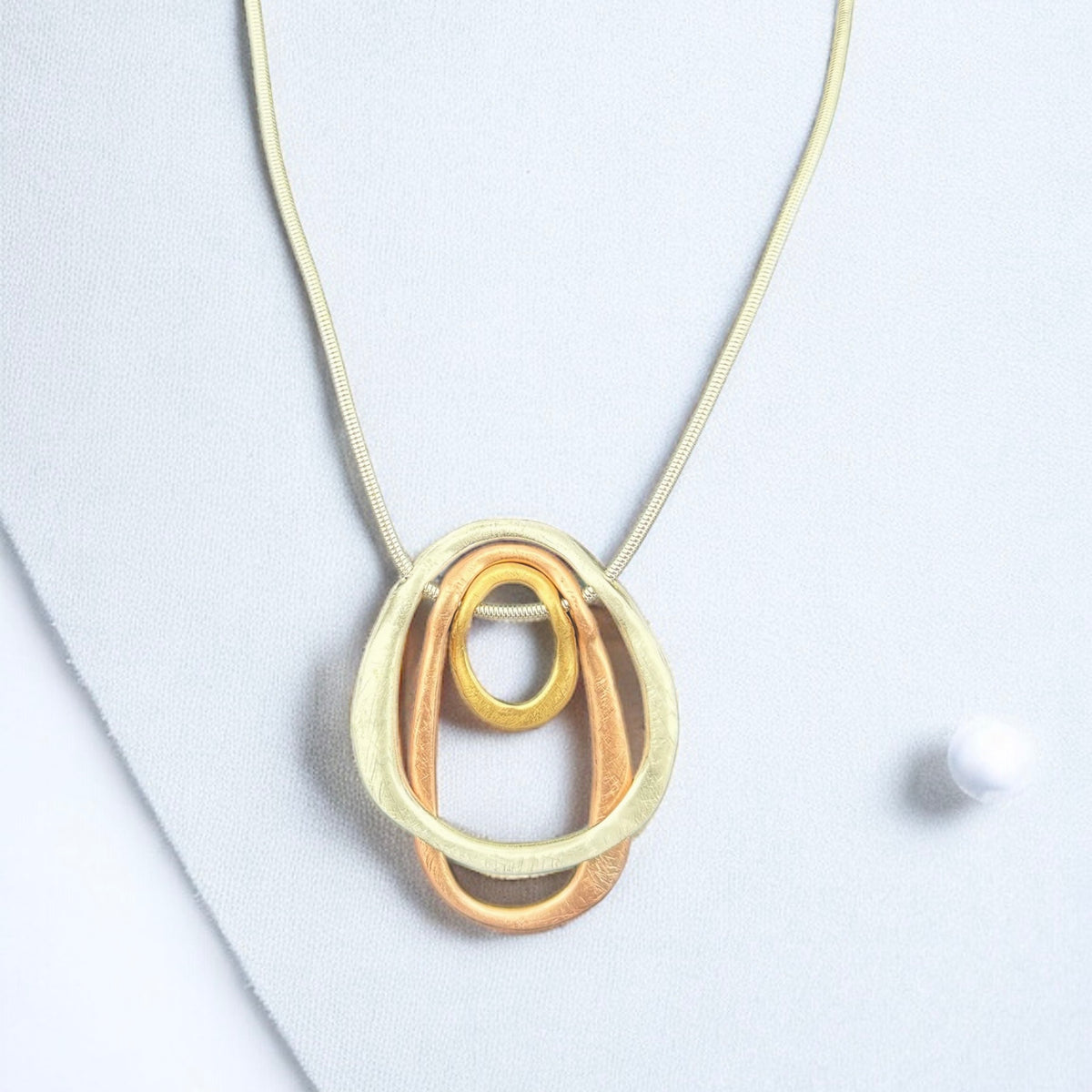 Three Ring Pendant Necklace – Tri-Tone Silver, Rose Gold and Gold – Denoon London – view 2