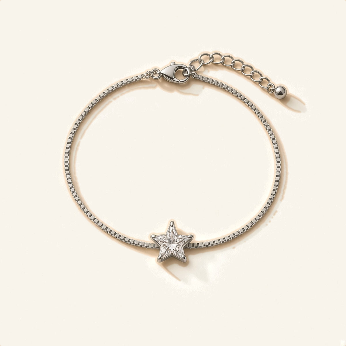 Denoon London silver-tone crystal bracelet with extender, star design, flat lay