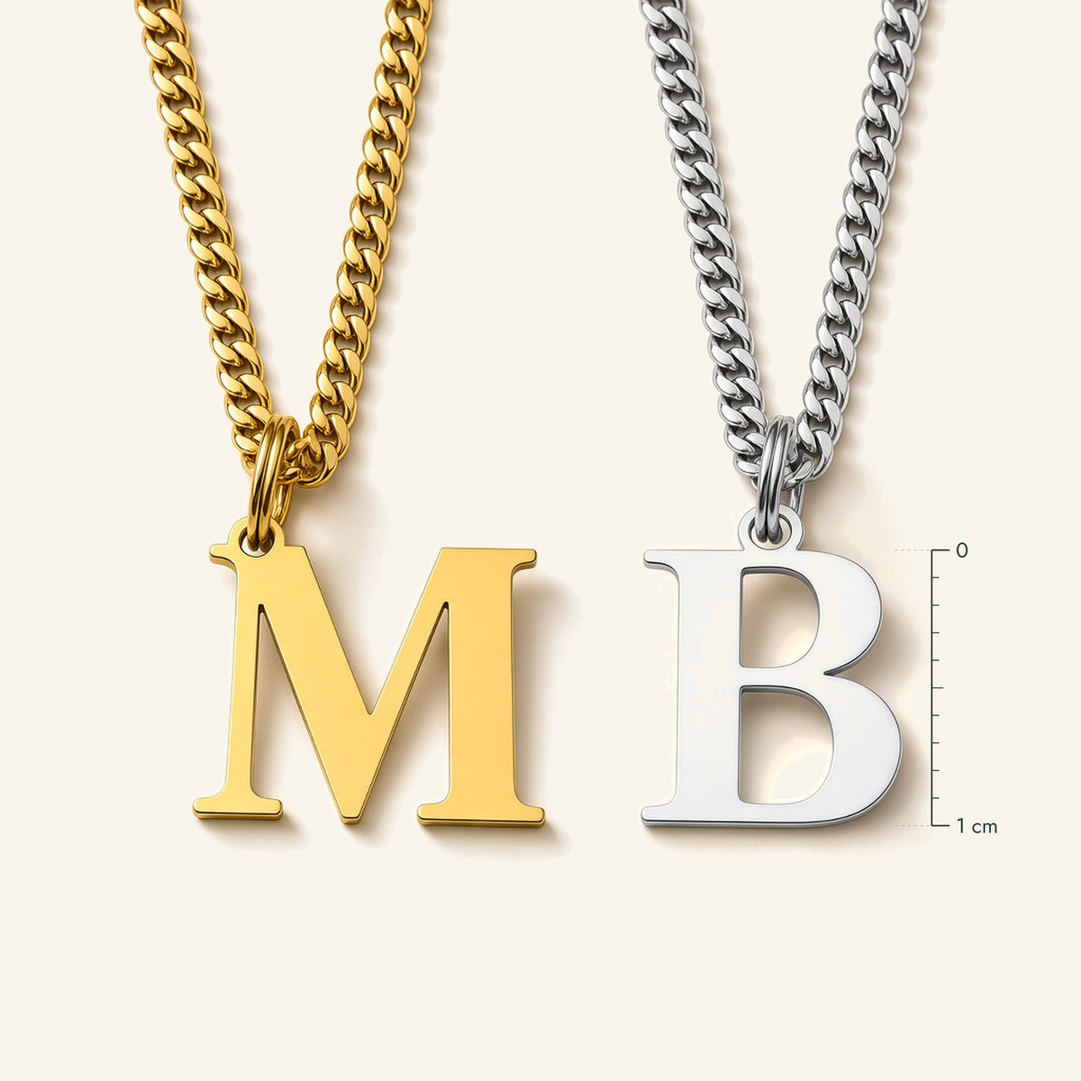 Denoon London Classic Initial necklace size guide, letters M and B on curb chain beside a ruler