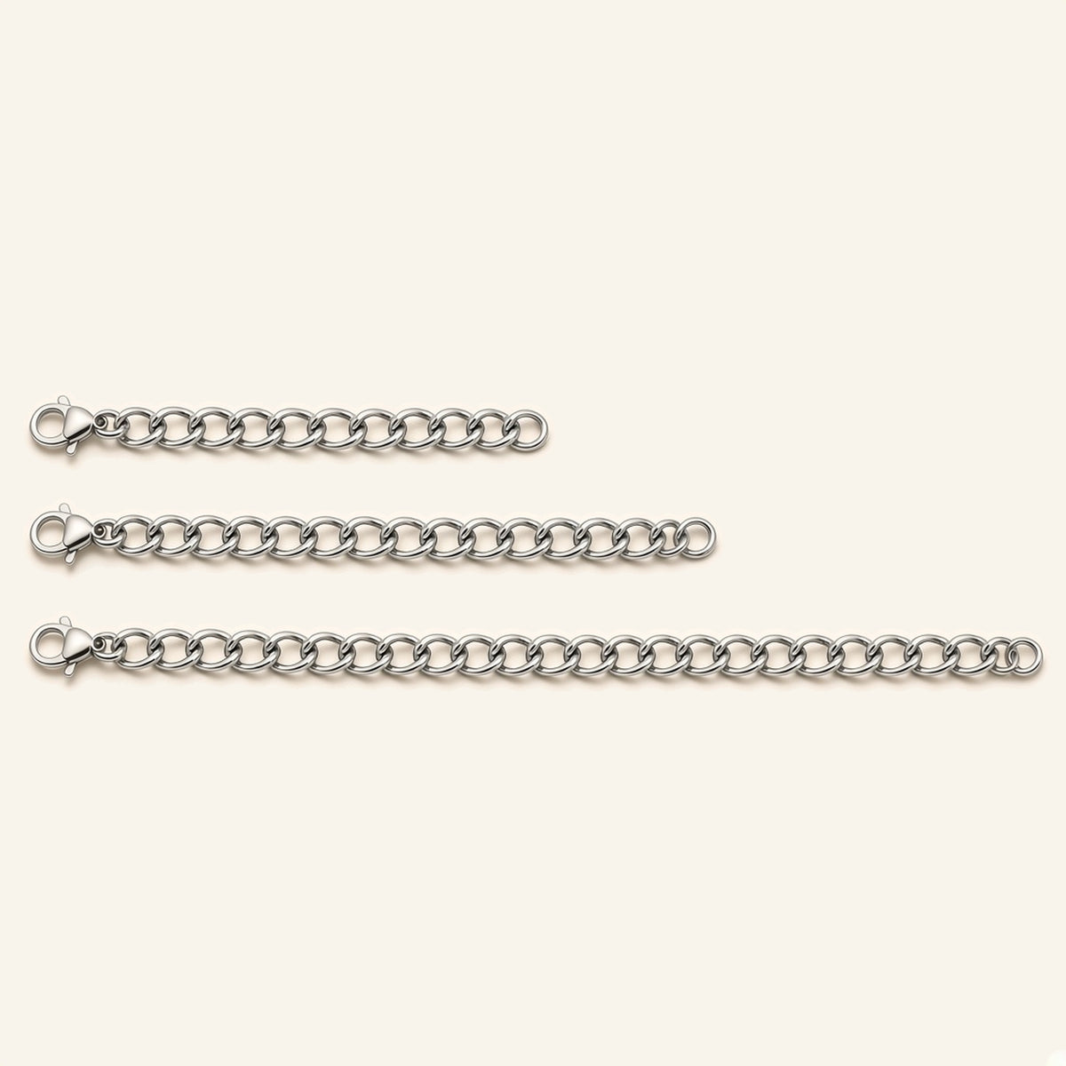 Denoon London silver-tone necklace extender chains in 7.5cm, 10cm and 15cm, flat lay