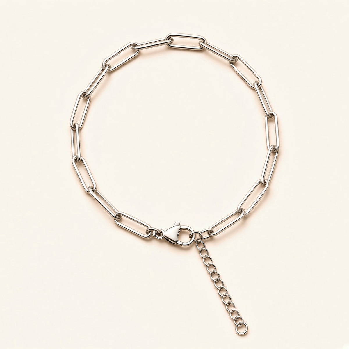 Denoon London paperclip chain bracelet with extender, silver-tone, flat lay