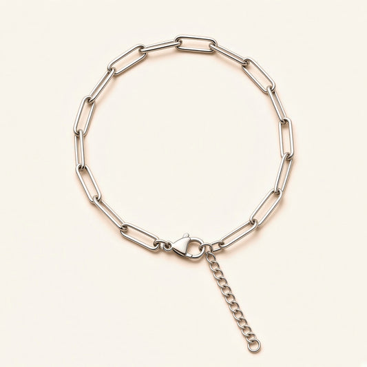 Denoon London paperclip chain bracelet with extender, silver-tone, flat lay