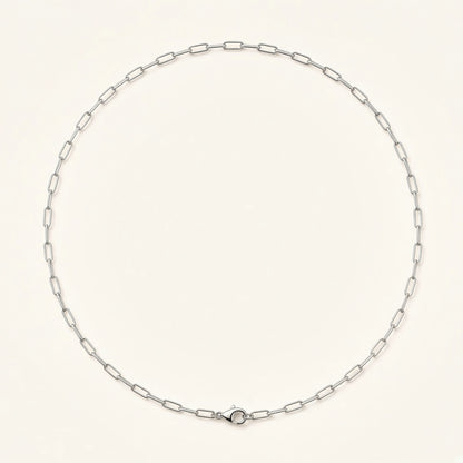 Denoon London paperclip chain necklace, silver-tone, flat lay