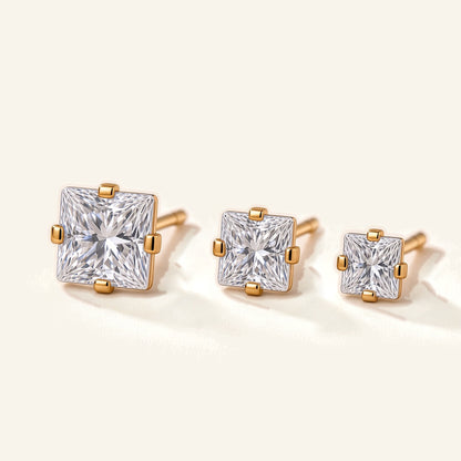 Denoon London Square Crystal Stud Earrings Set of 3 in gold-tone, 6mm, 5mm and 4mm, flat lay on cream