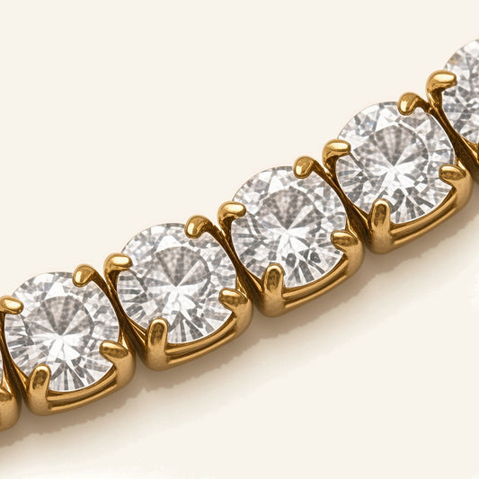 Denoon London Adjustable Tennis Bracelet, gold-tone – close-up of the crystal row